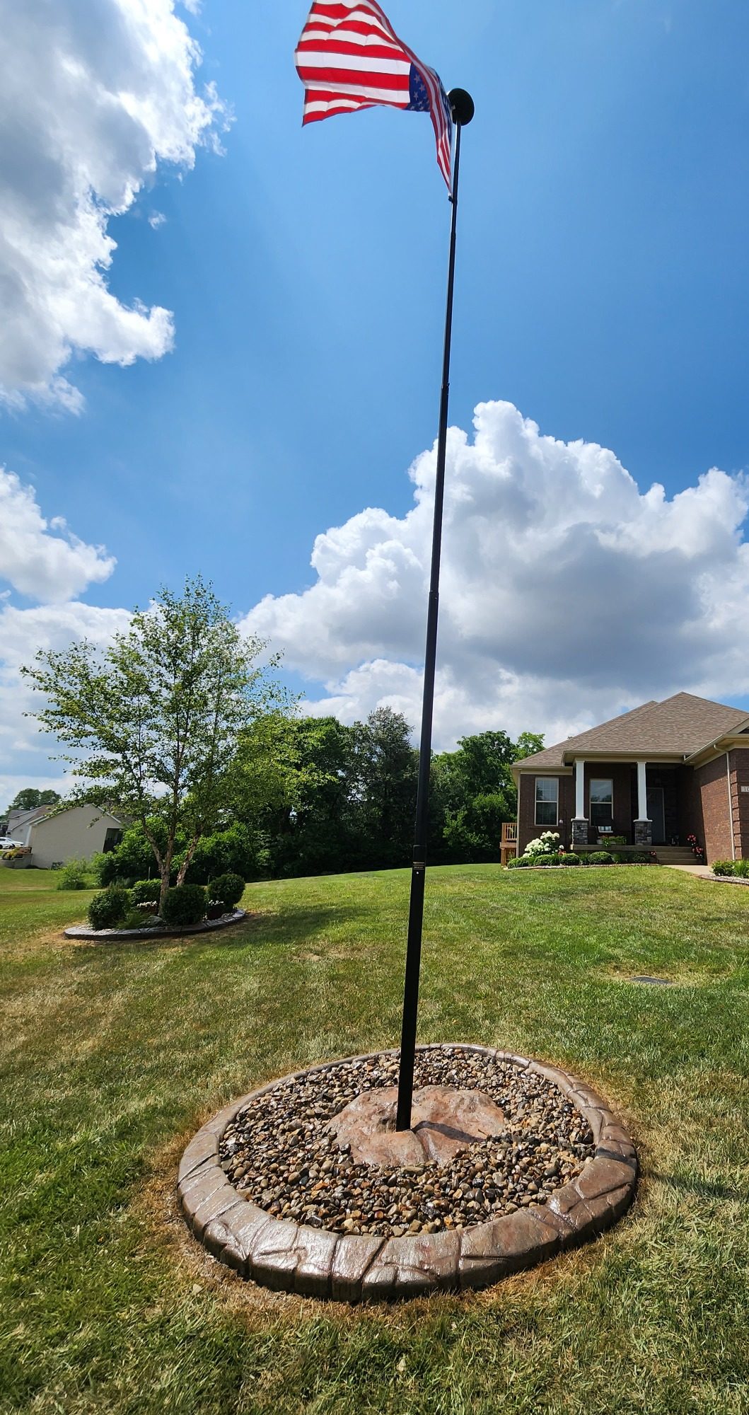 Custom edging around flag pole